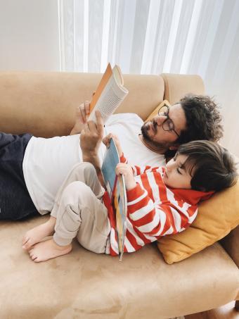 Dad and child reading